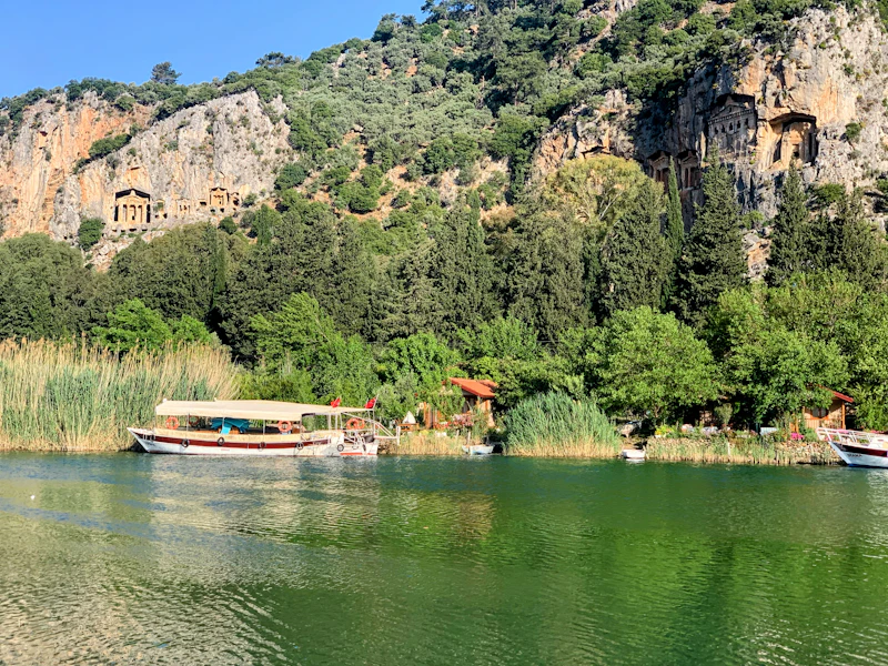 Dalyan river boat below the ancient Lycian King's Rock Tombs