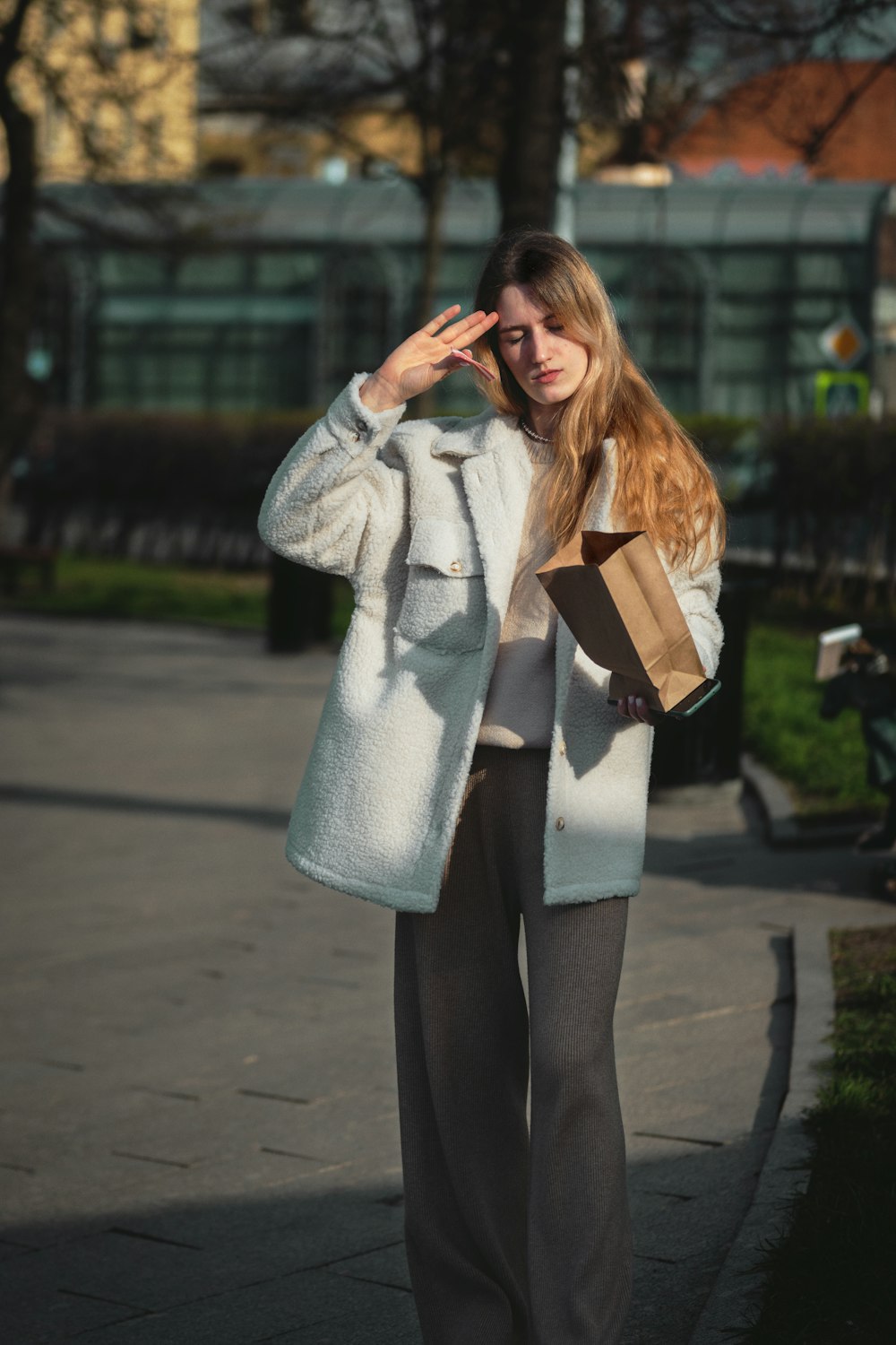 a person in a grey suit