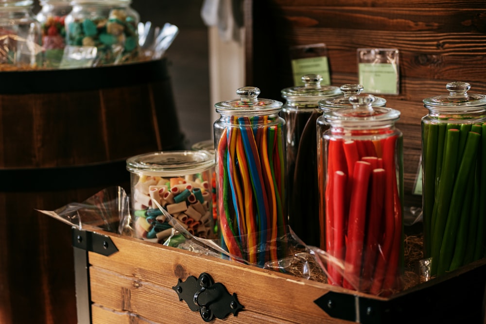 a group of glass jars