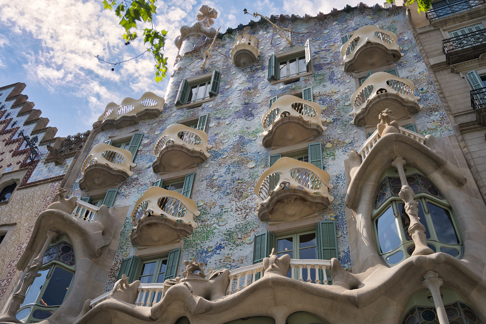 The sculptural roofline and decorative details of Casa Batlló in Barcelona