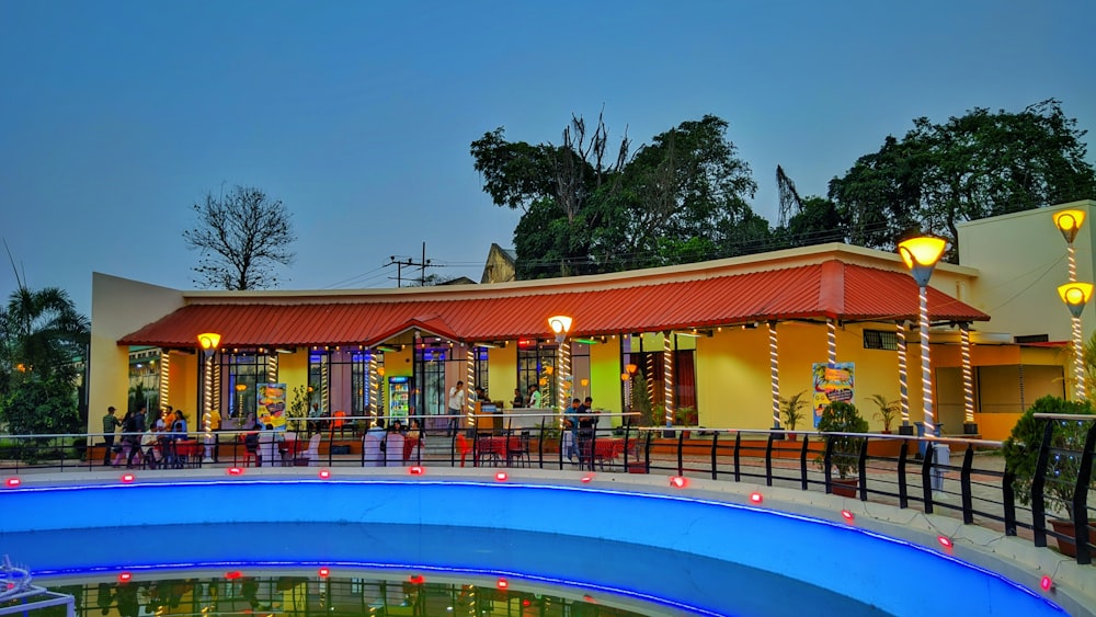 a building with a pool in front