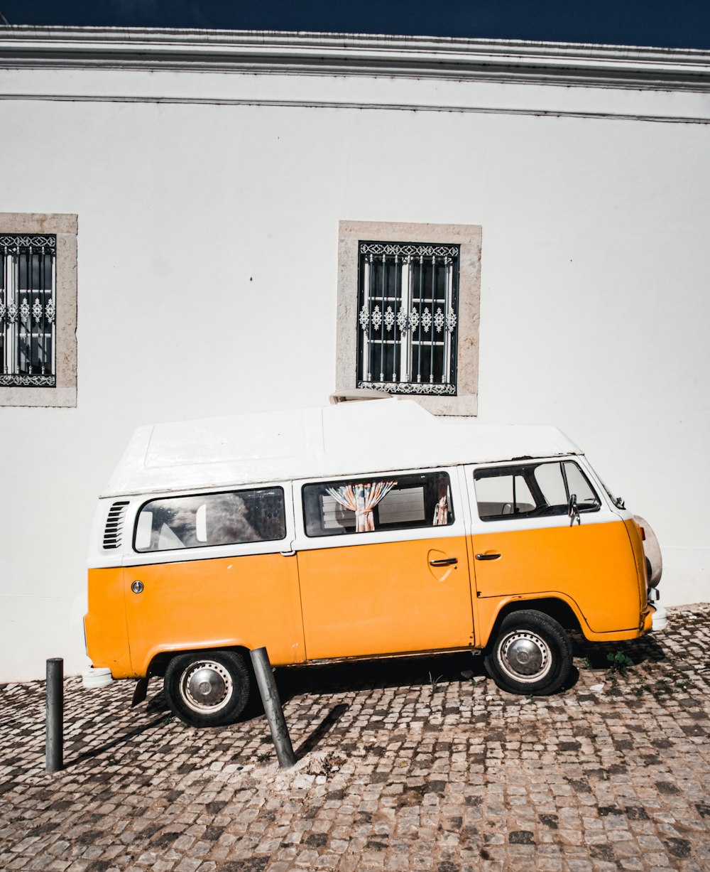 a van parked in front of a building