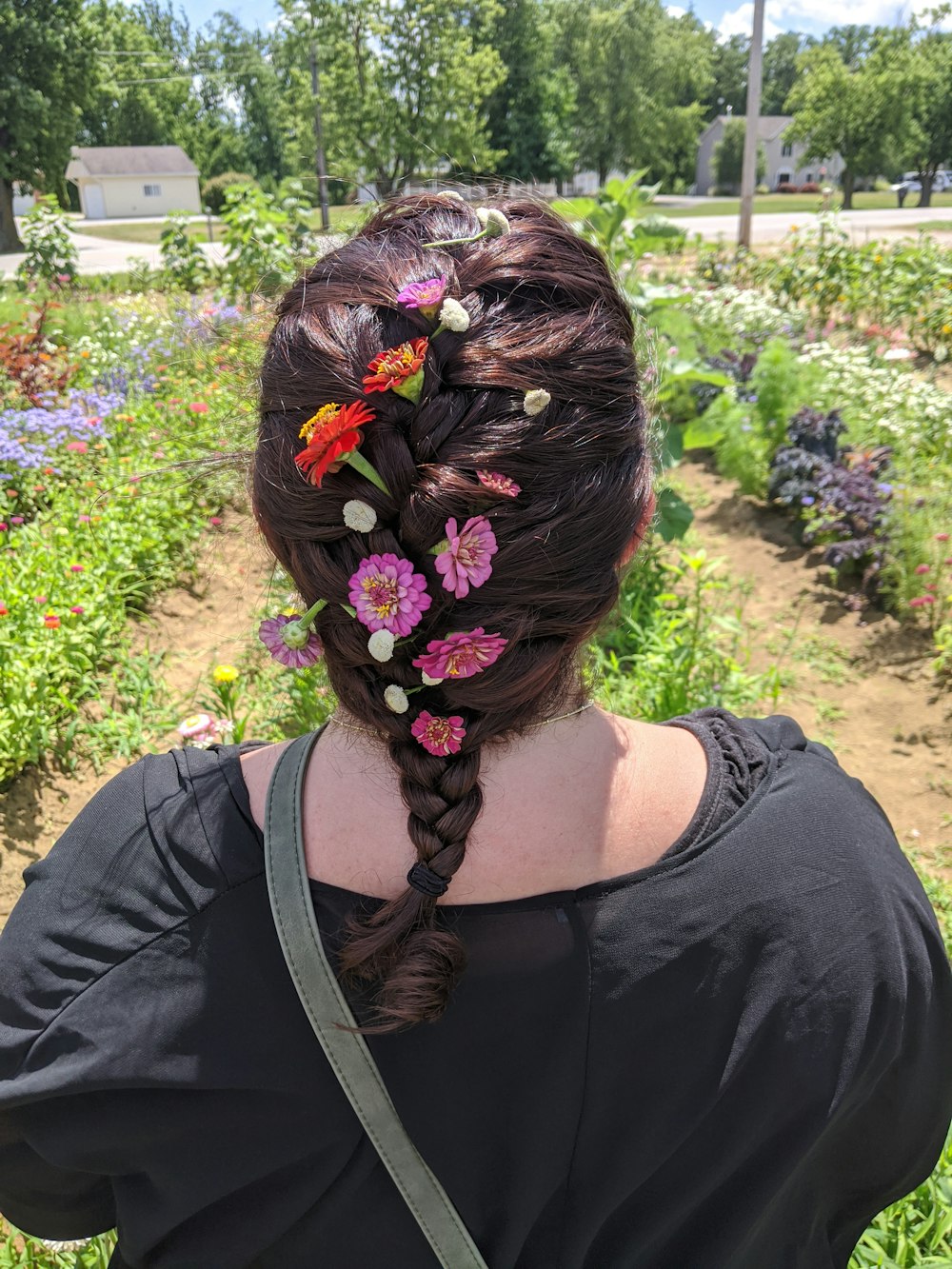 a person with flowers in the hair