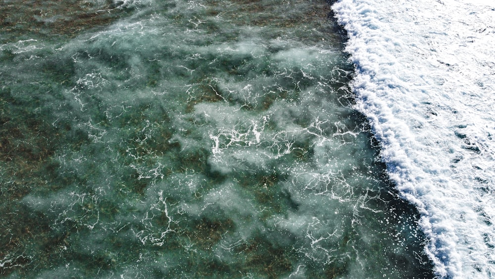 a body of water with waves