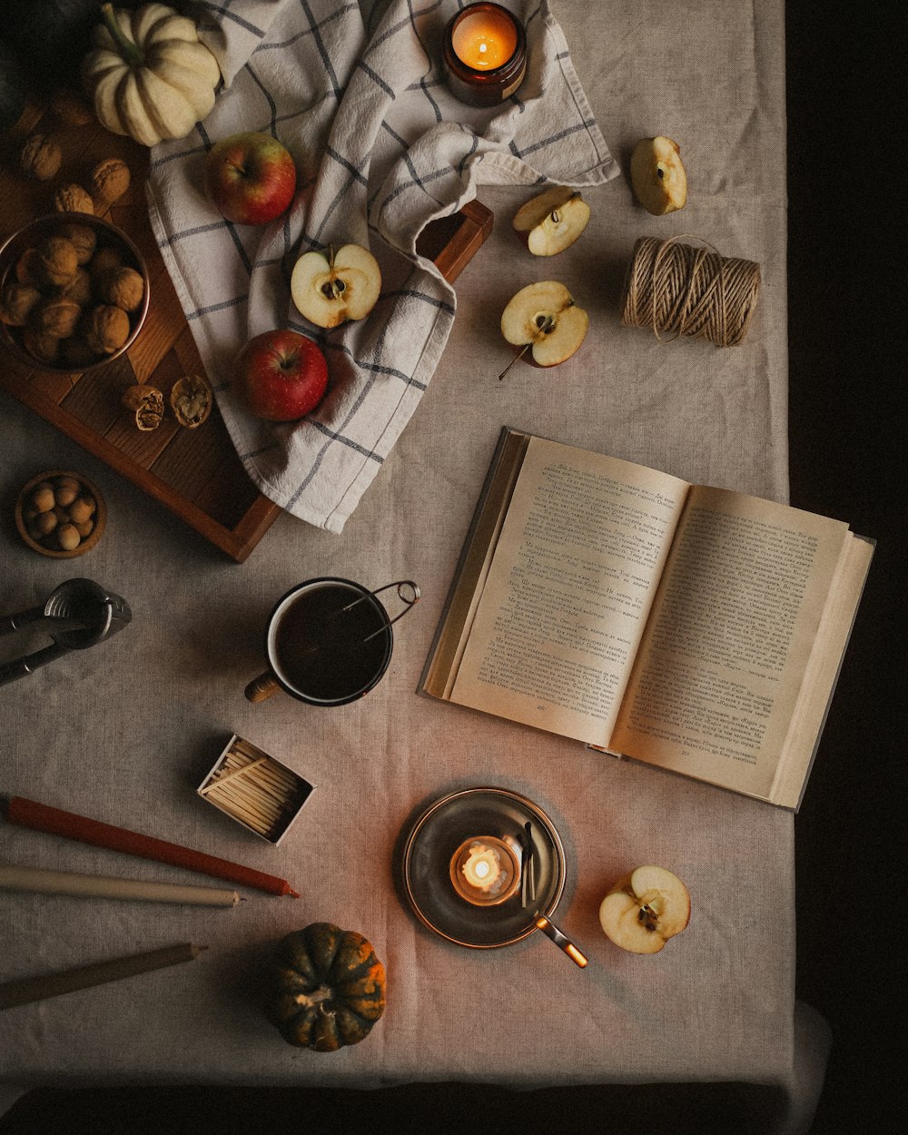 a book and glasses on a table