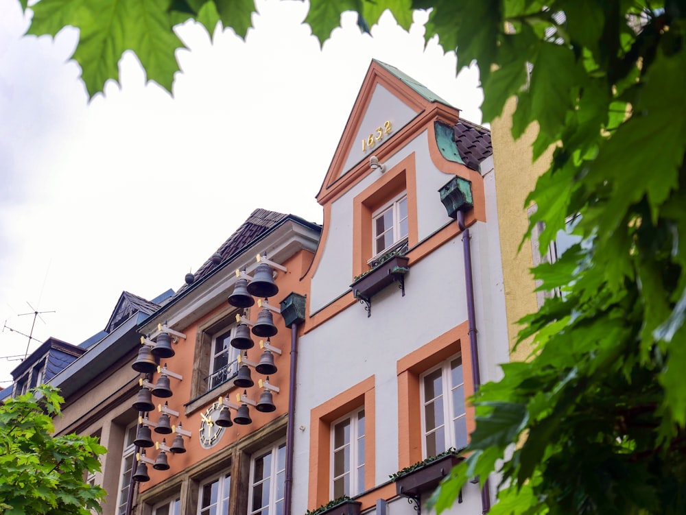 a building with a tree in the front