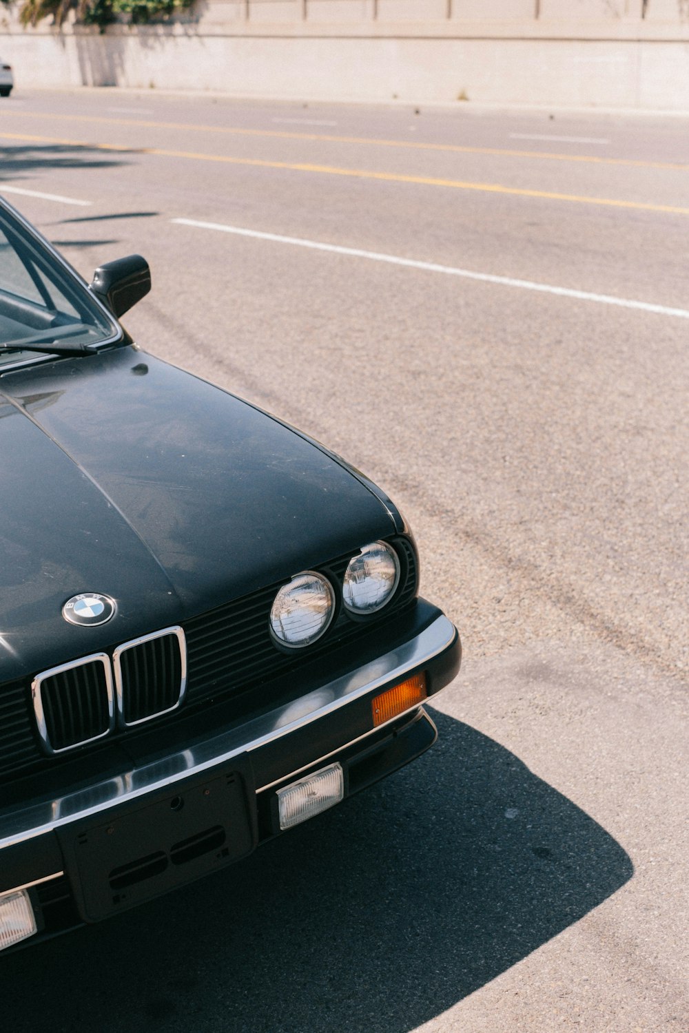 a black car parked on a street