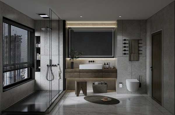 Modern hotel bathroom with a curbless glass walk in shower