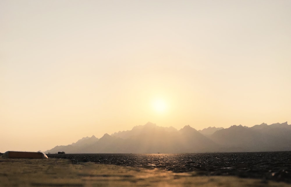 a landscape with hills in the back