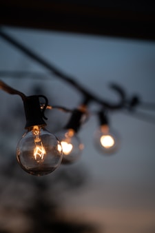 a light bulb with a flame