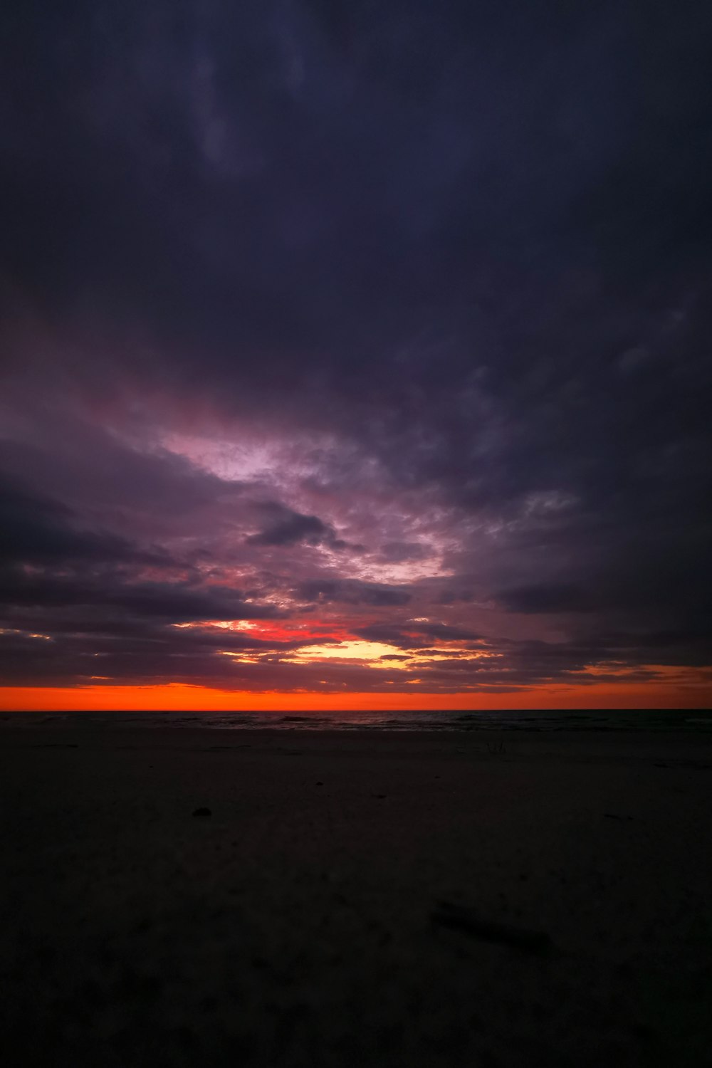 a sunset over a beach