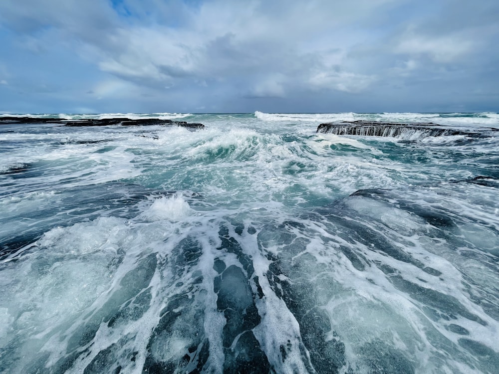 a body of water with waves