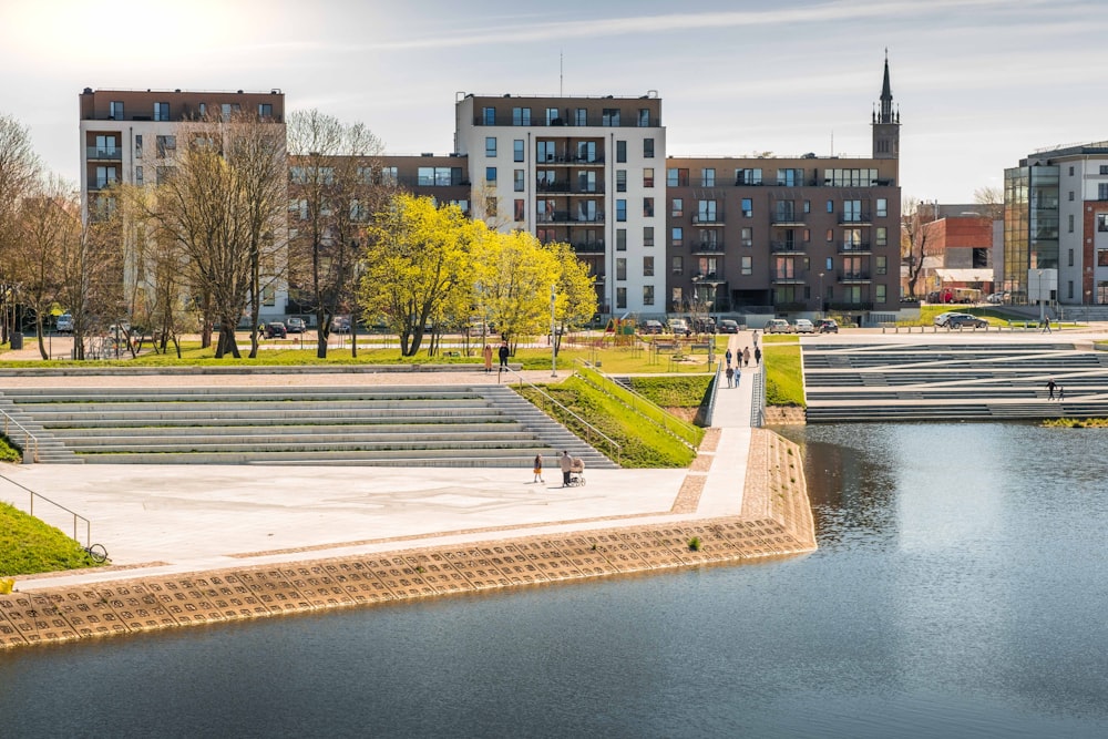 a body of water with buildings around it