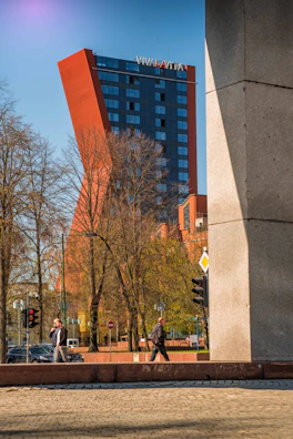 a tall building with a large glass window