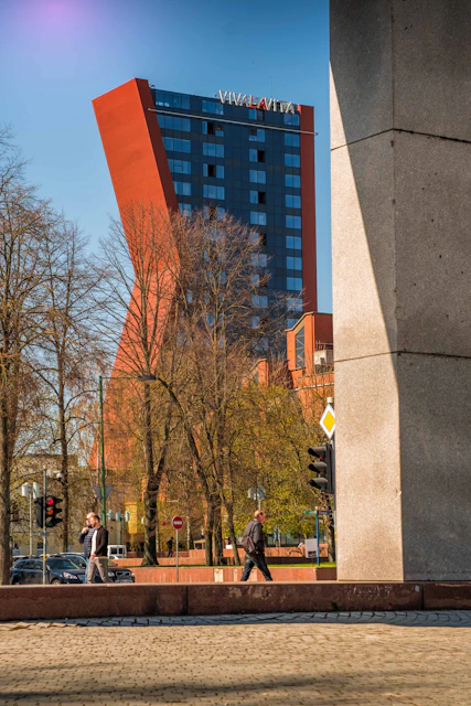 a tall building with a large glass window