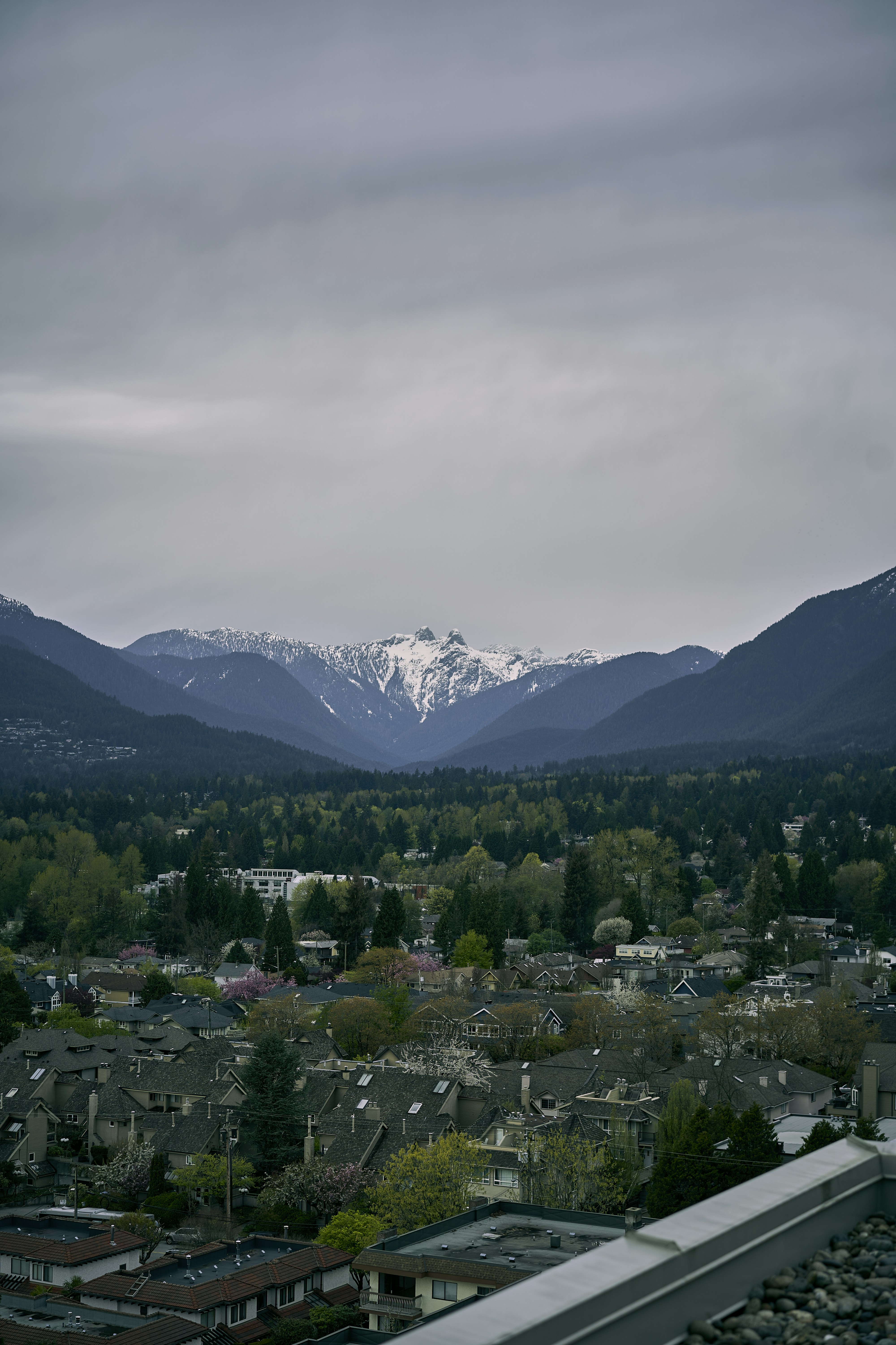 a city with mountains in the background