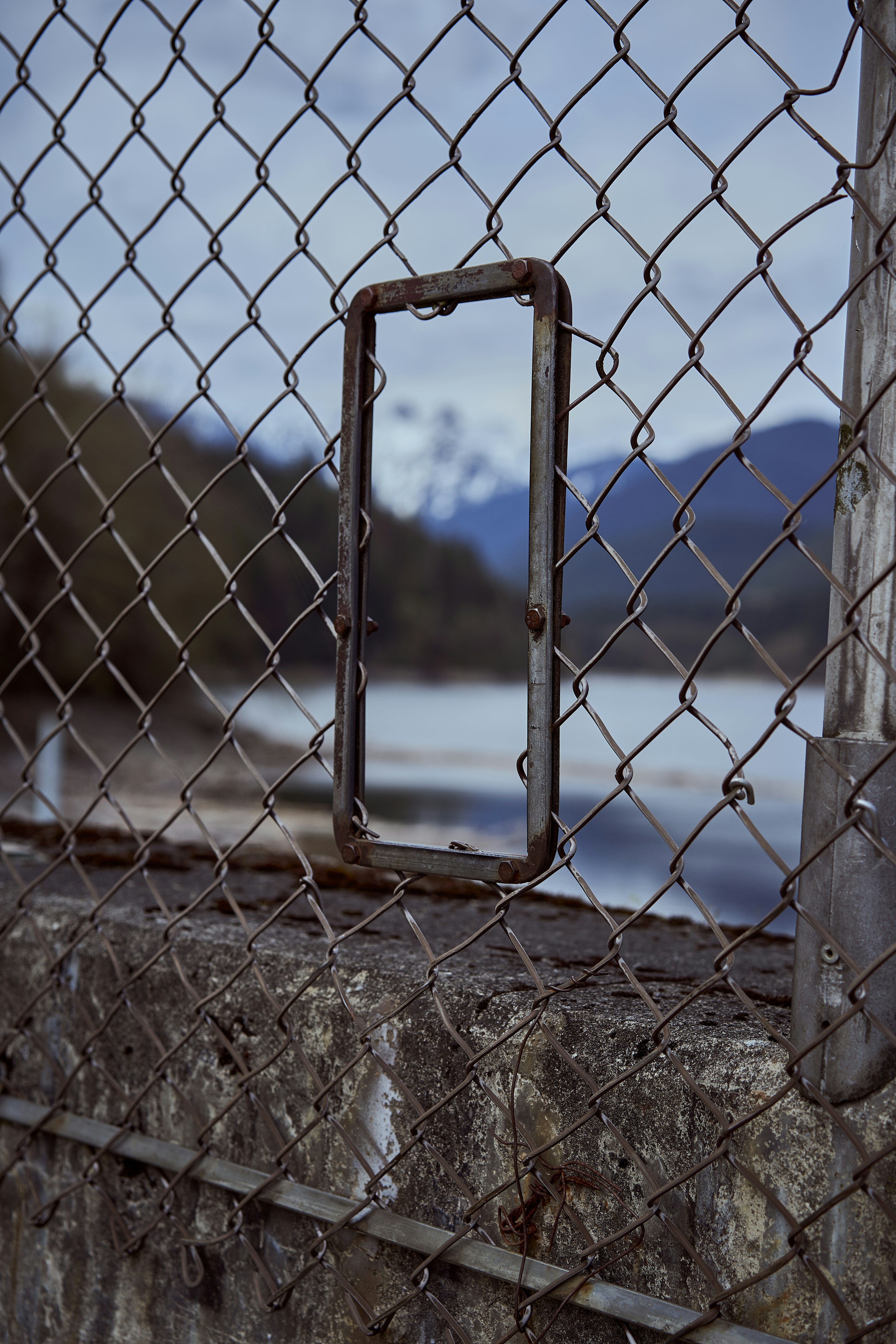 a metal fence with a metal frame