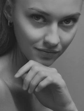Close-up of a serene individual reflecting healthy lifestyle and longevity.