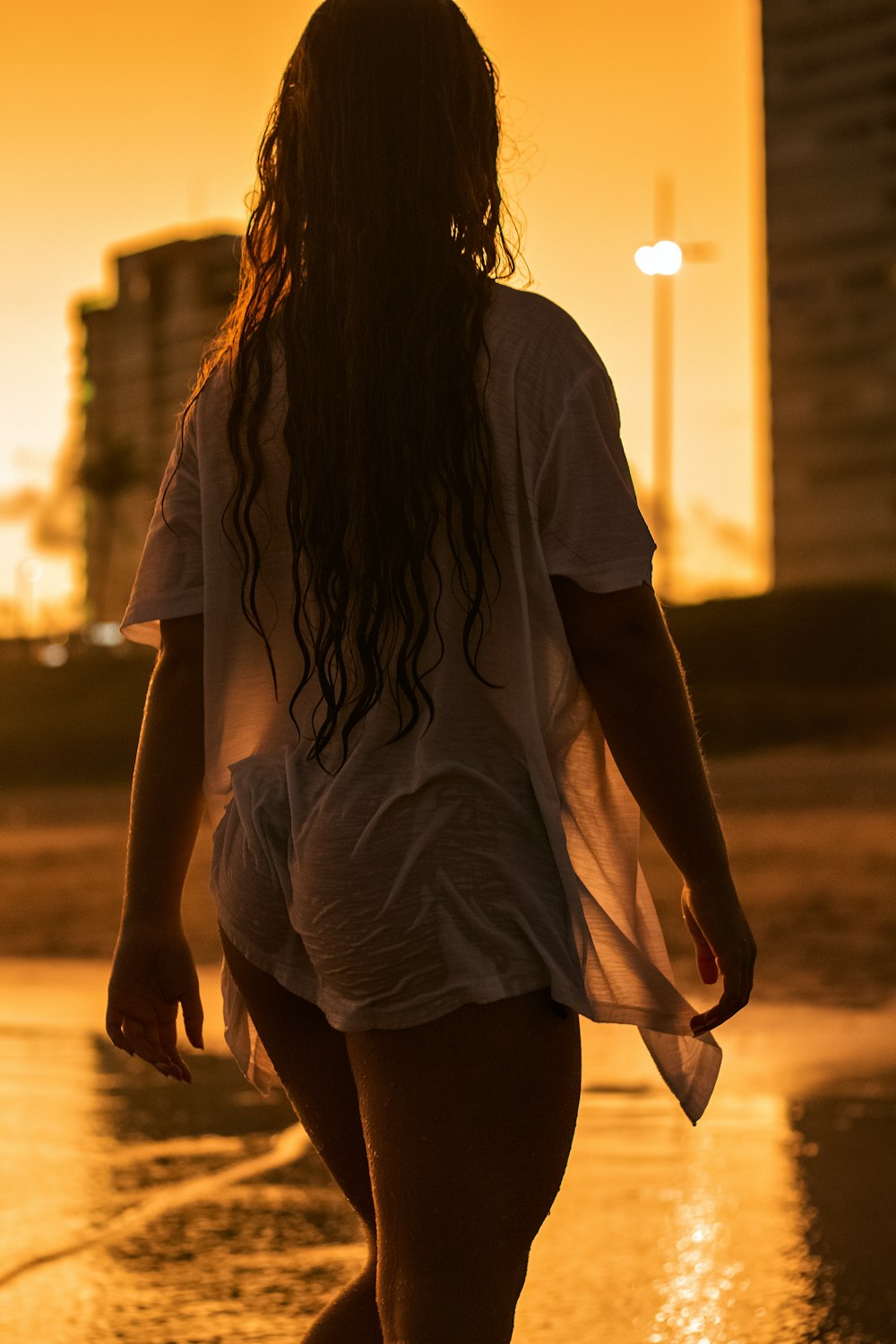 a person walking on a beach