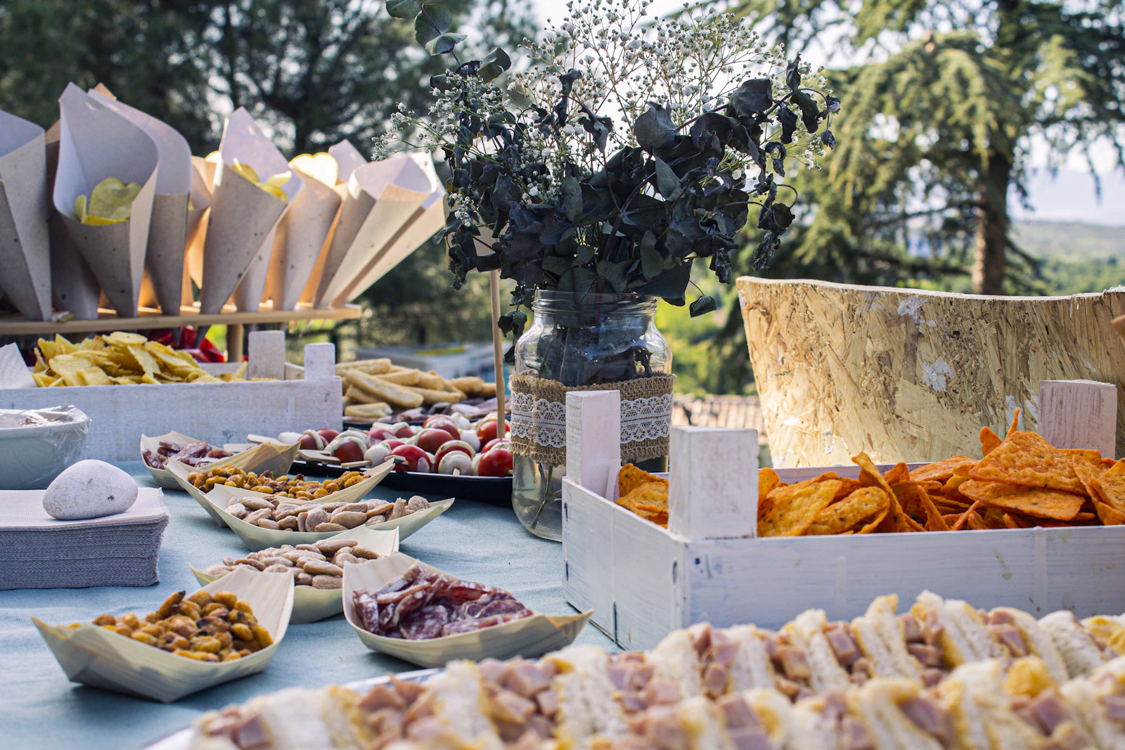 Outdoor celebration tables set for an evening party