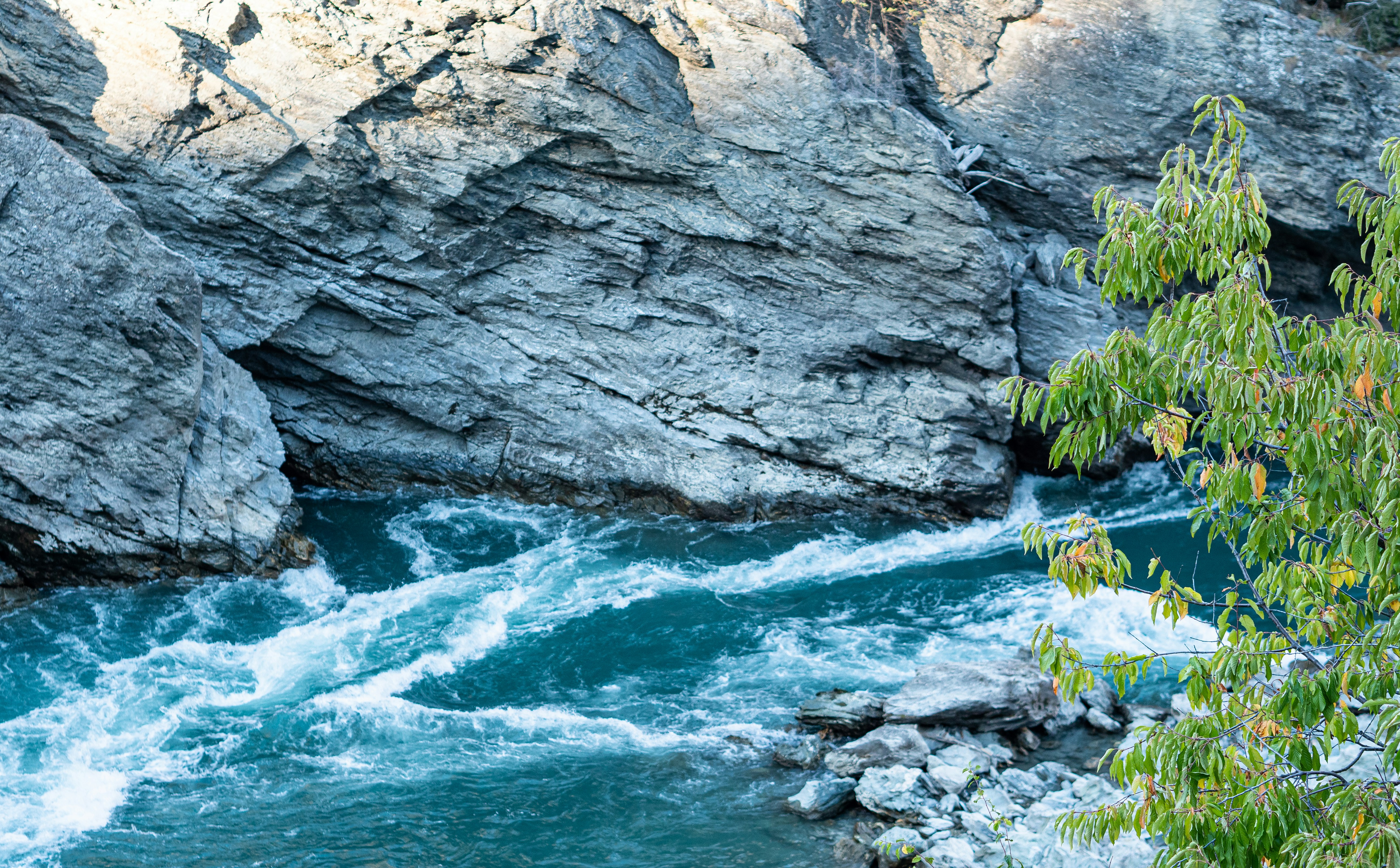 a river flowing between large rocks
