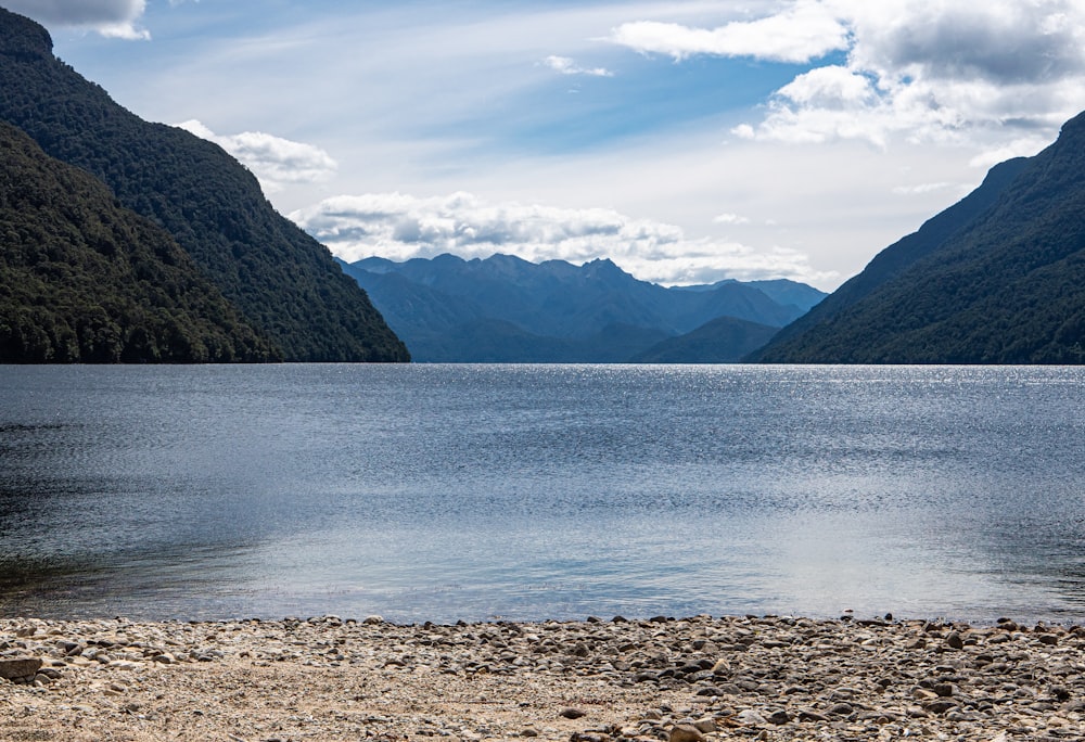 a body of water with mountains in the background with Chilliwack Lake in the background