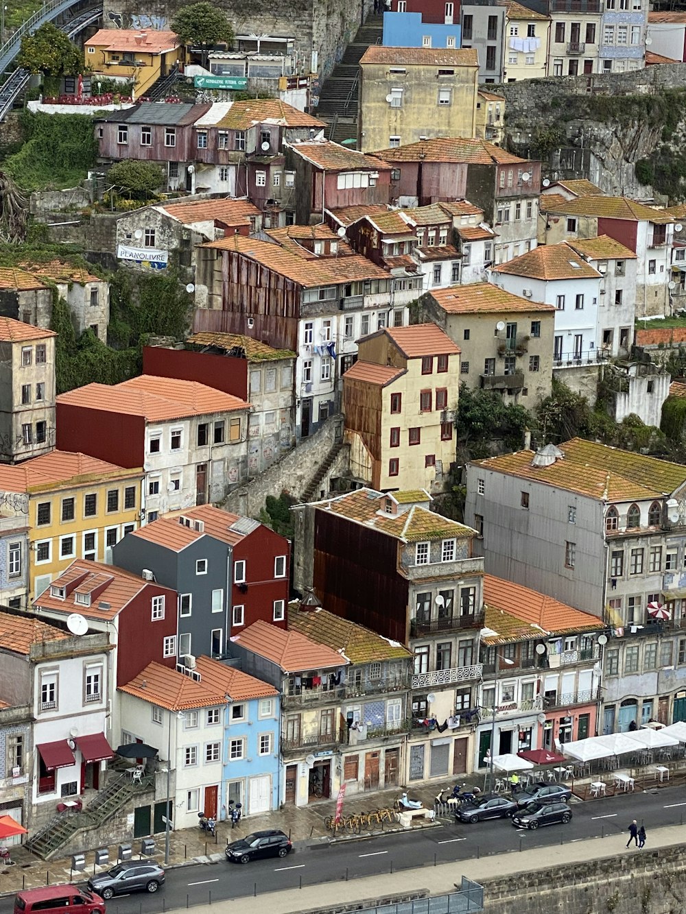 a group of buildings with red roofs