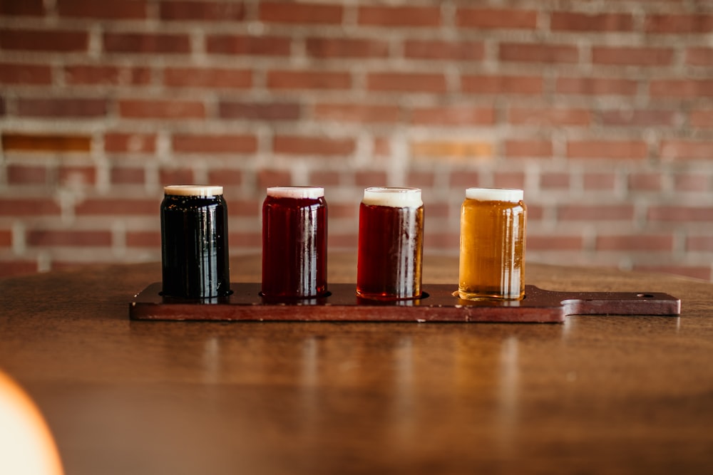 a group of beer glasses on a table