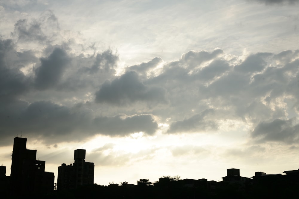 a cloudy sky over a city