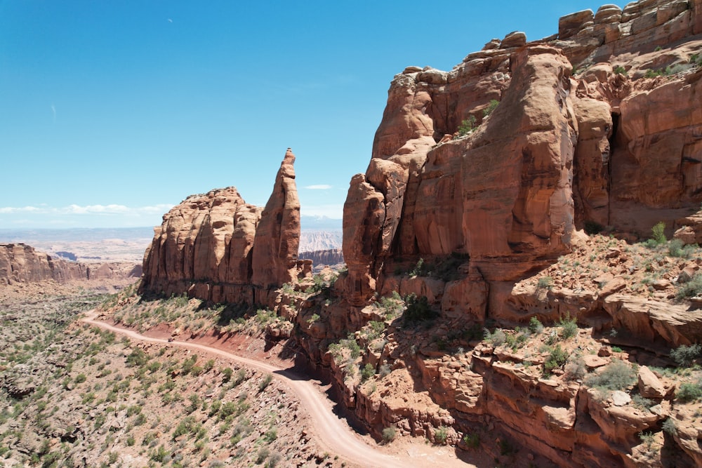 a rocky mountain with a road