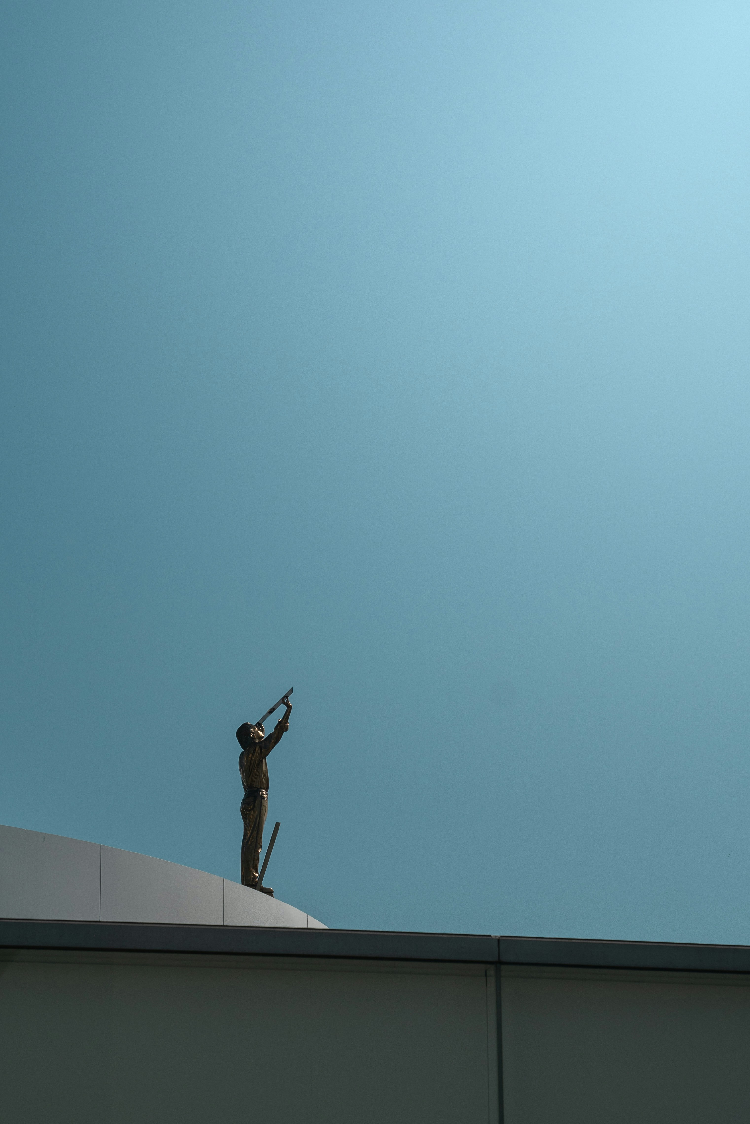 a statue on top of a building
