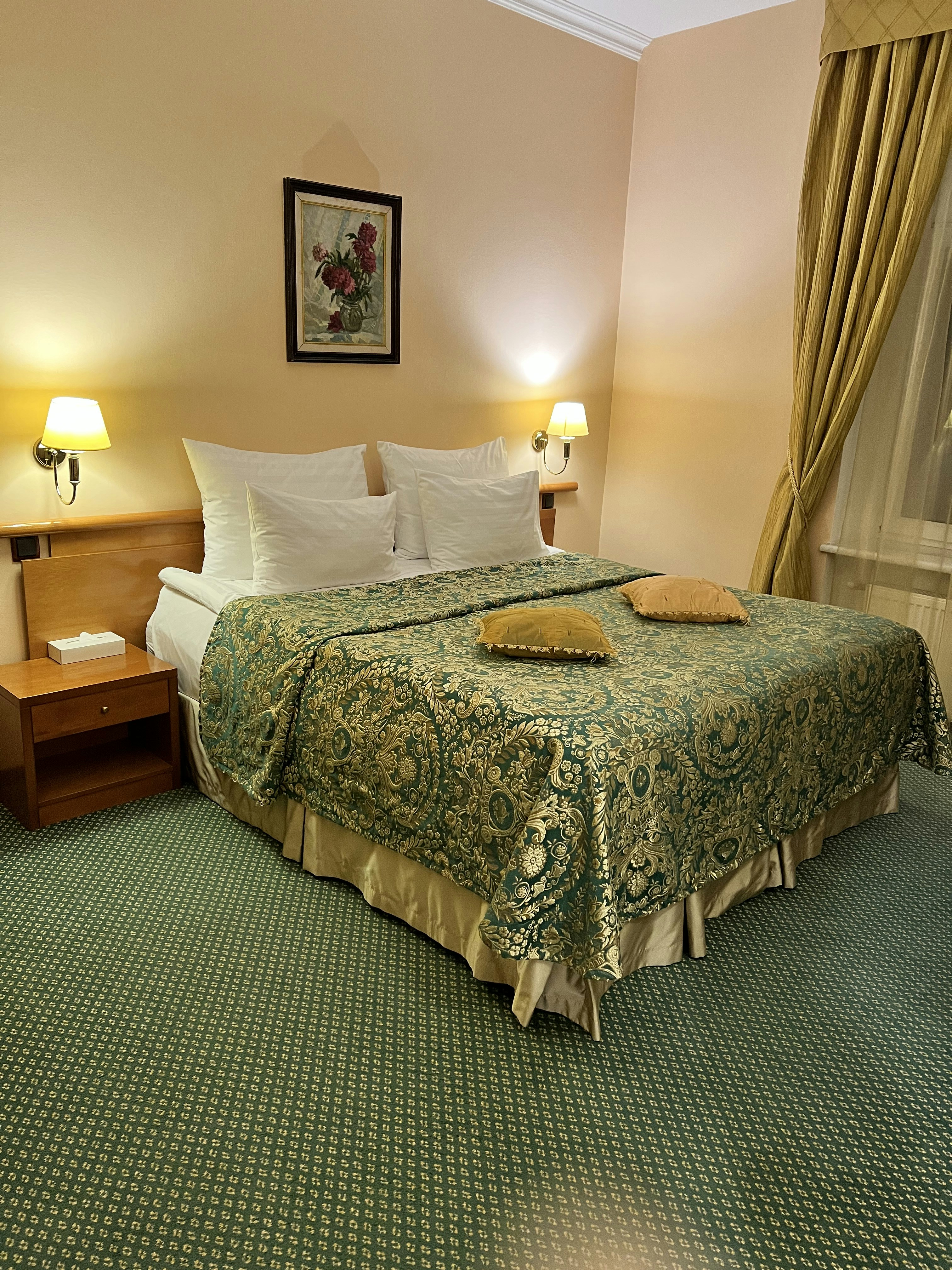 a bed with pillows and pillows