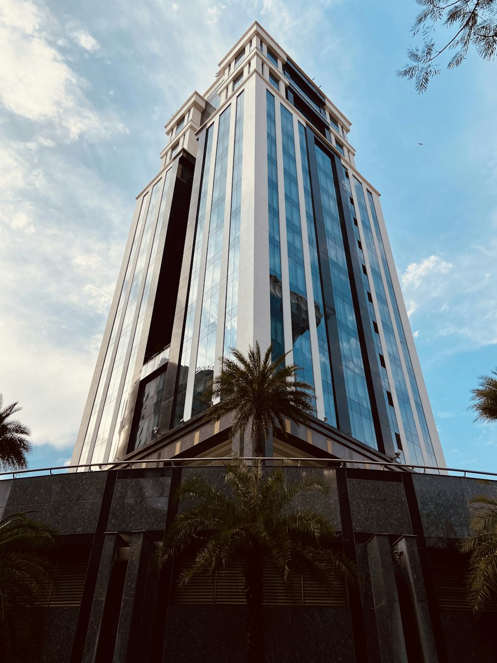 a tall building with glass windows