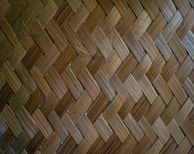 Close-up of finely woven bamboo chick blinds showcasing natural texture and craftsmanship.