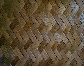 Close-up of finely woven bamboo chick in natural light showcasing craftsmanship.
