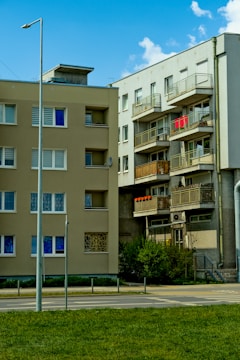 a building with balconies and a street light