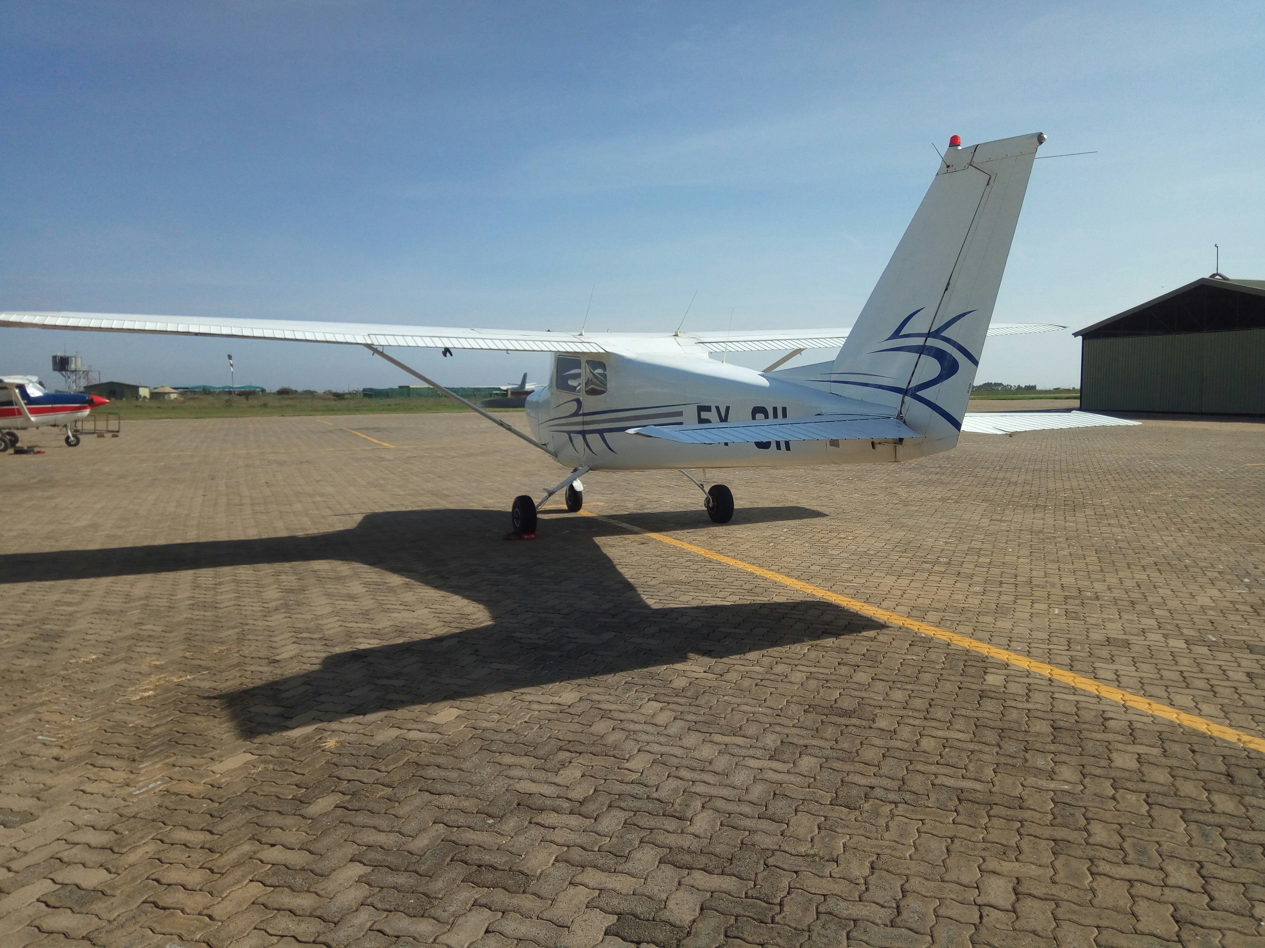 a small airplane on the runway