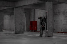 a man standing in a parking lot