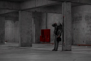 a man standing in a parking lot