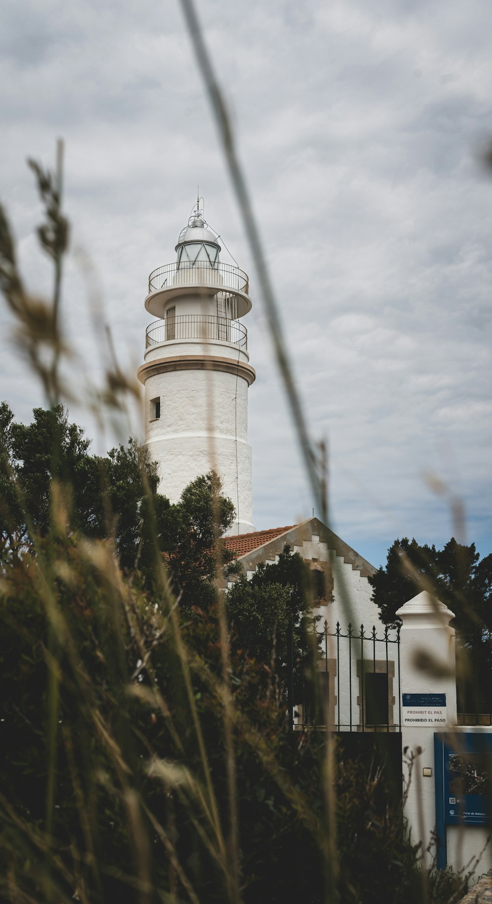 a white tower with a white top