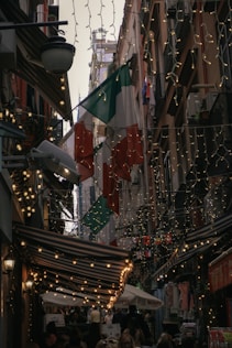 a street with many shops and people