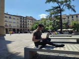 a man sitting on a bench