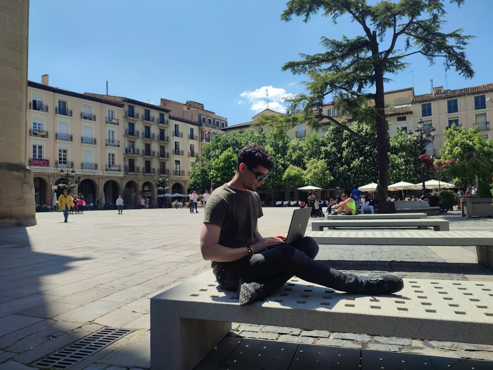 a man sitting on a bench