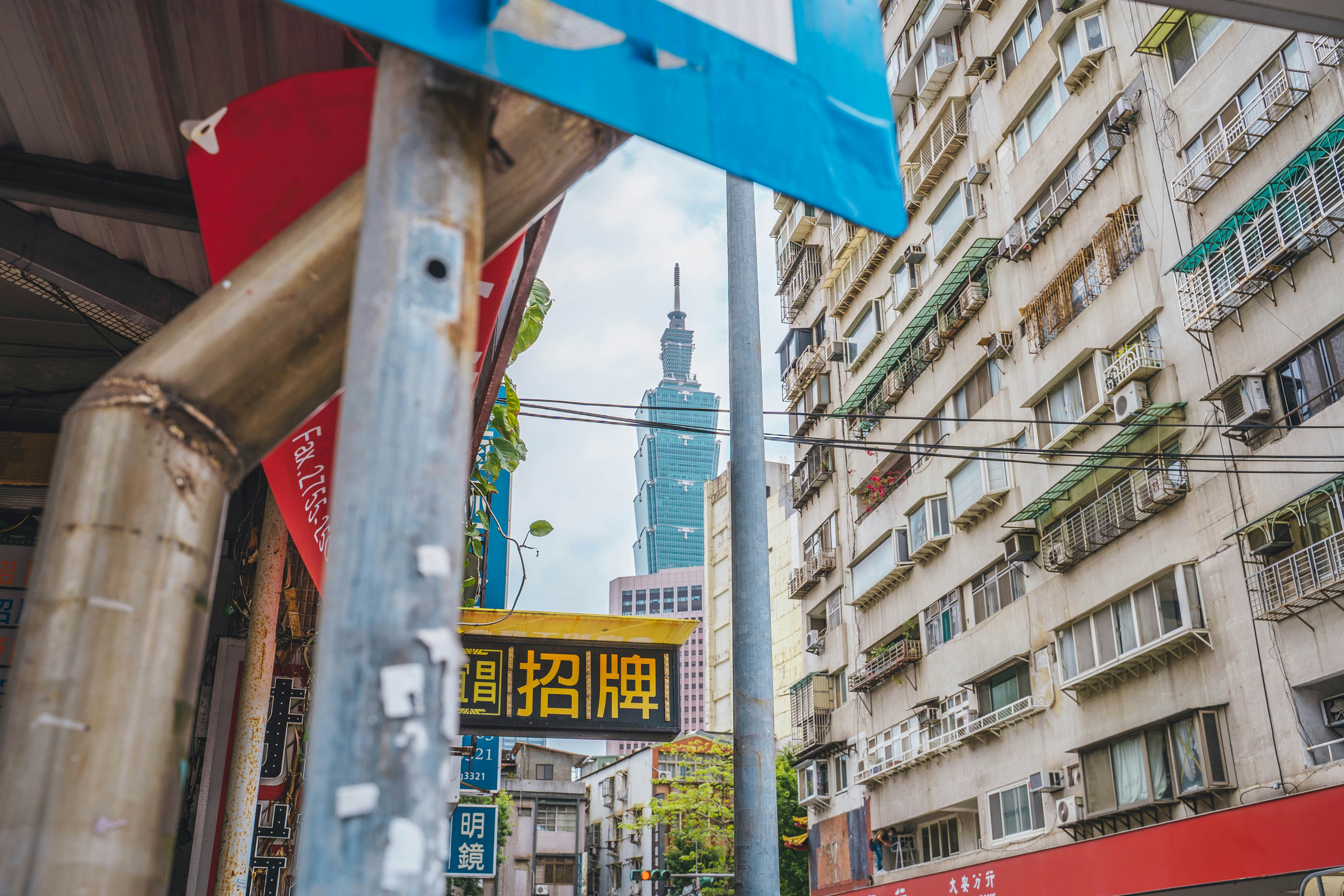 Street in Taipei with a view on the Taipei 101, Taiwan.