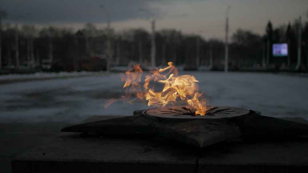 a fire pit with a fire in it