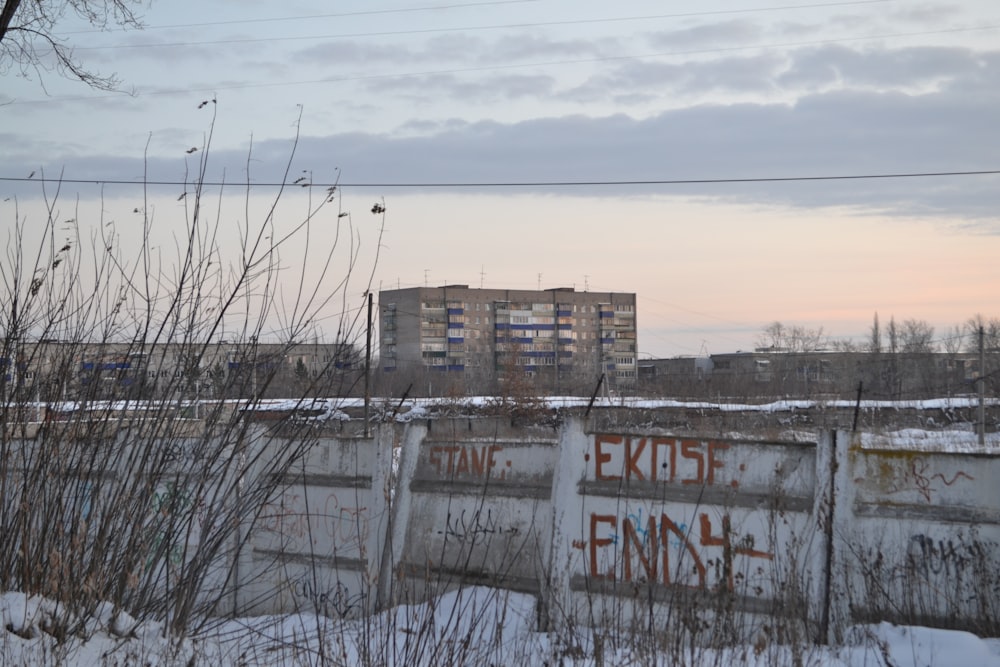 a building behind a fence