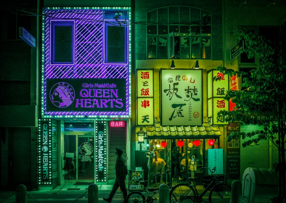 a person walking in front of a storefront