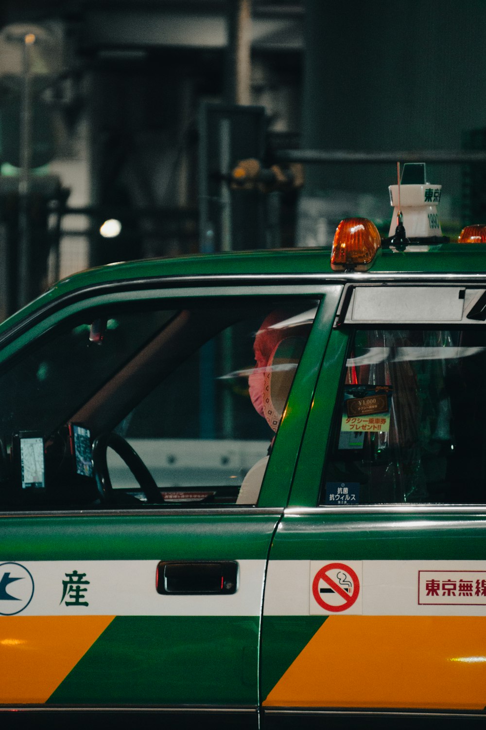 a green and white ambulance