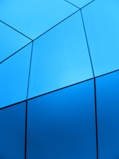 a blue sky with many wires