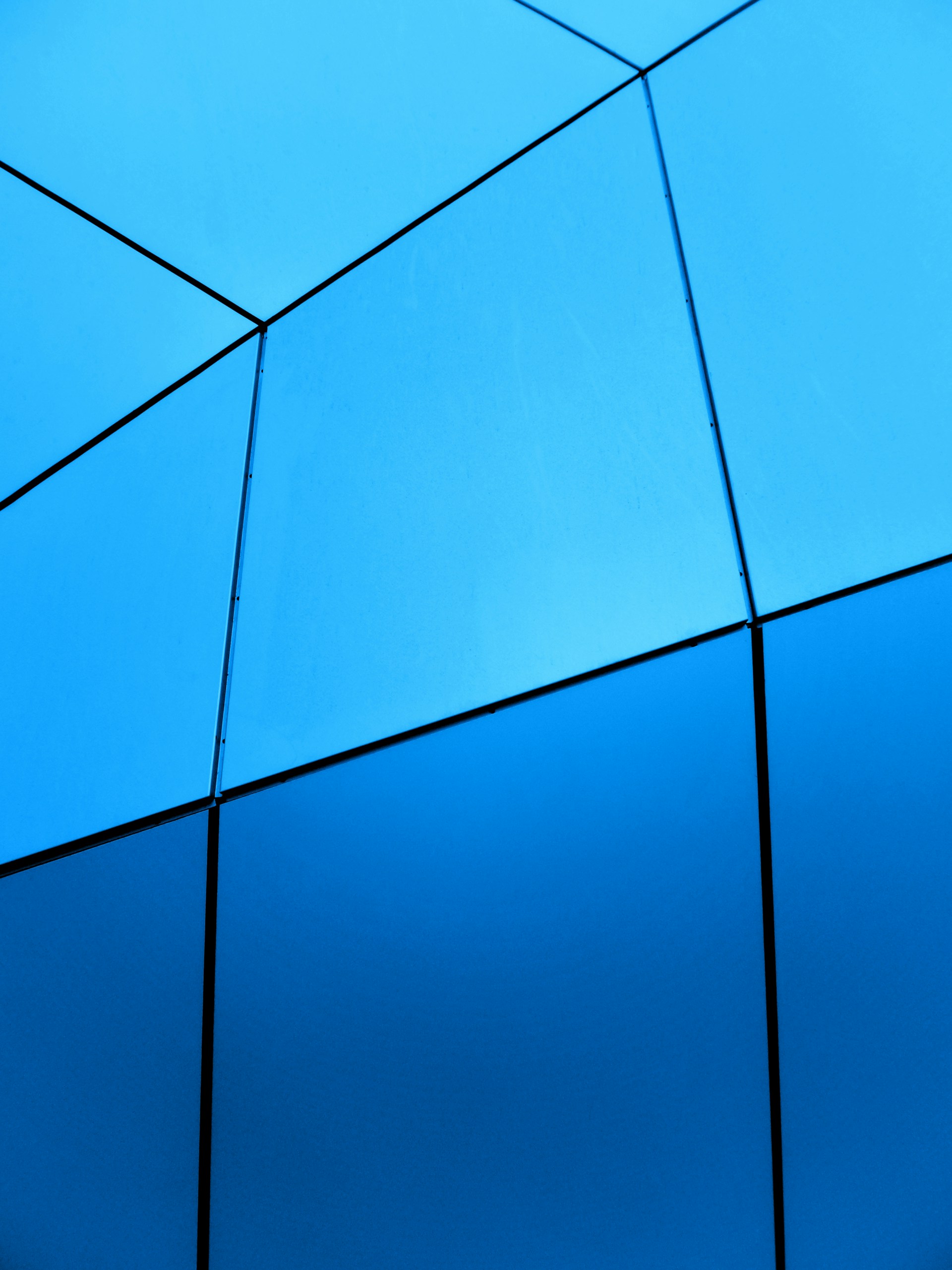 a blue sky with many wires